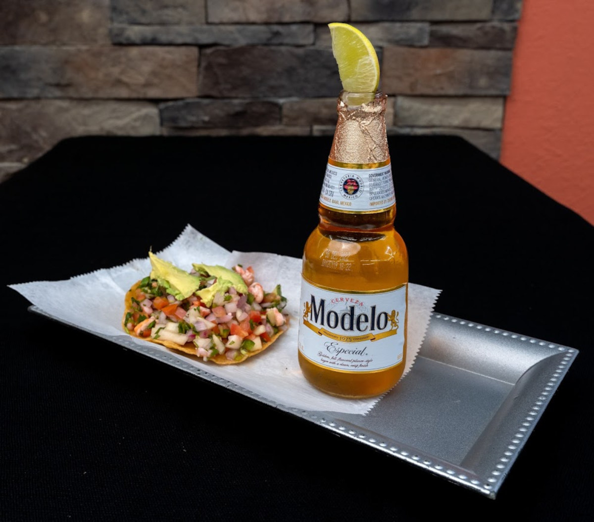 Ceviche Tostada and a bottle of Modelo beer